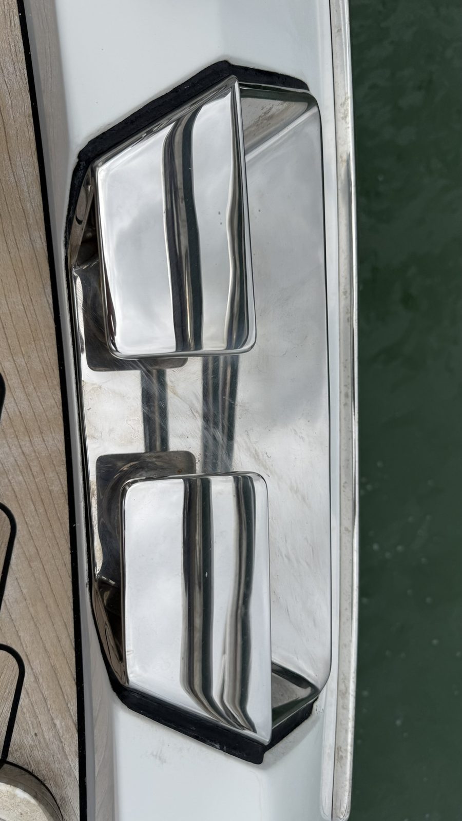Same chrome cleat restored to a mirror shine after polishing