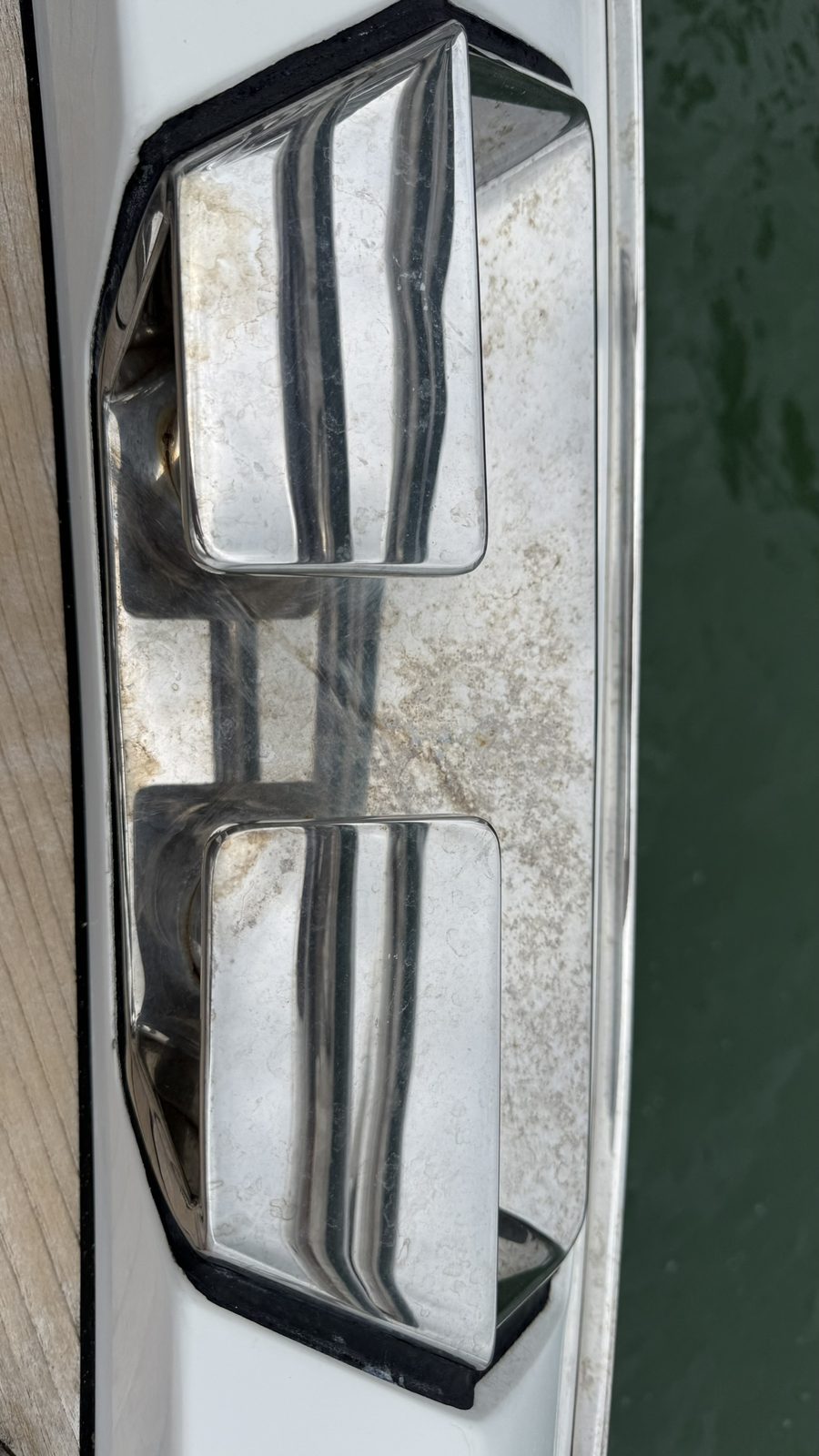 Oxidized, tarnished chrome cleat before polishing