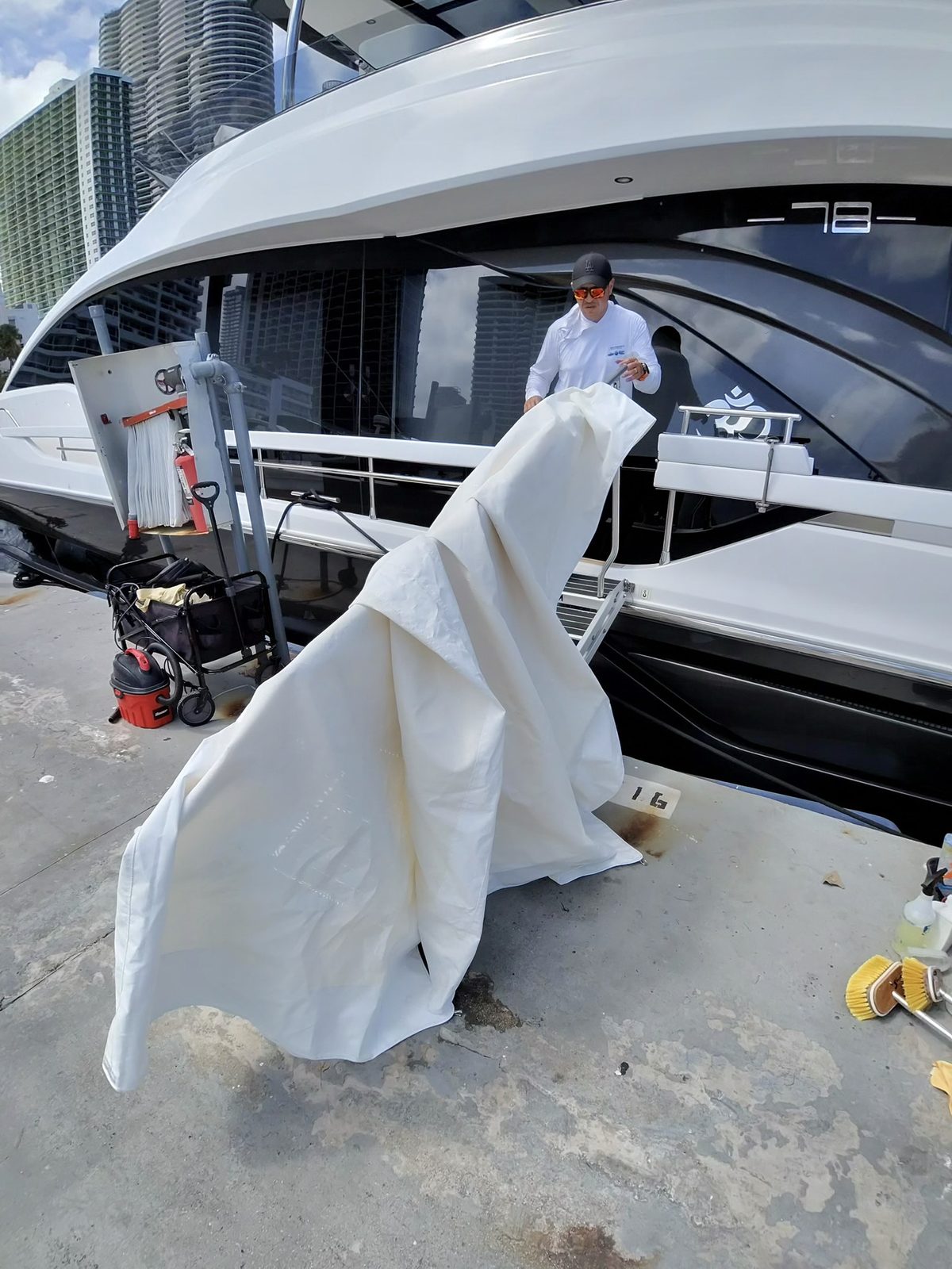 Pro Polishing MIA technician working dockside in Miami