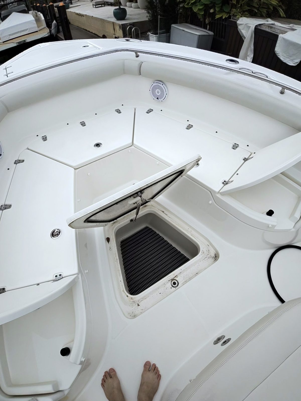 Clean bow storage compartment after detailing