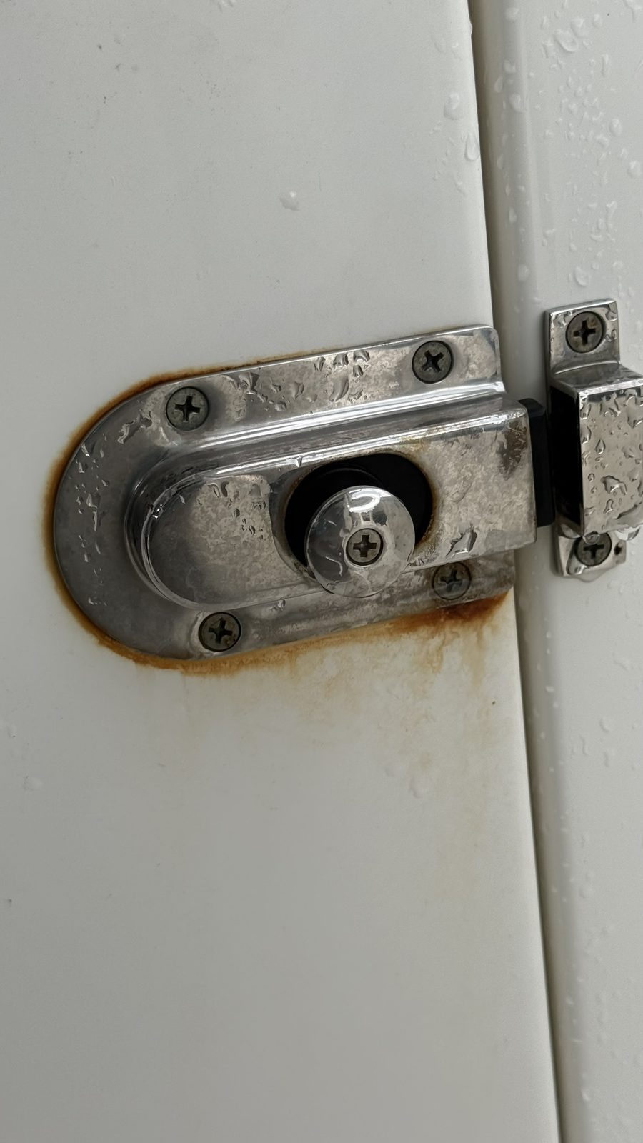 Oxidized boat door latch before polishing